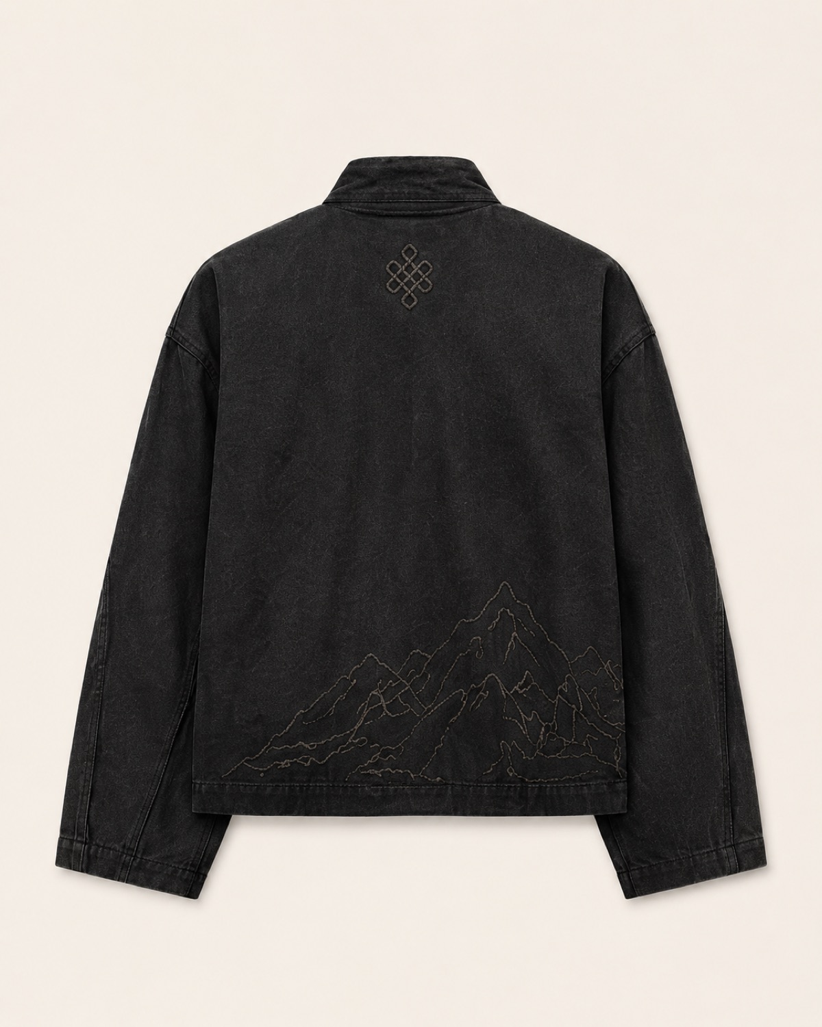 Achala daura jacket — back: eternal knot at the nape, mountain range across the hem